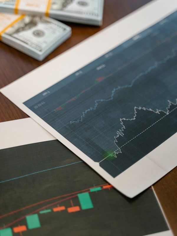 Man technical market analyst using advanced trading platforms and charts